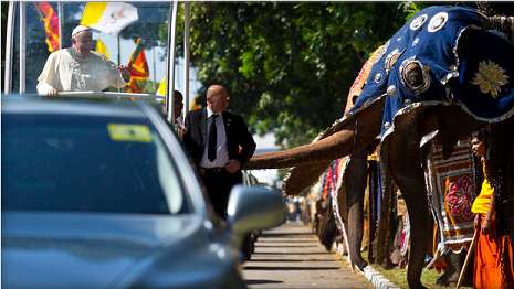 Pope greeted by 40 elephants and 21-canon salute in Sri Lanka